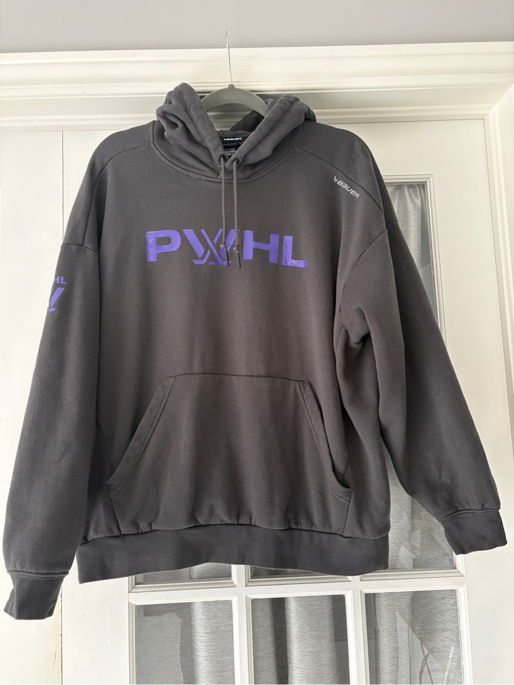 PWHL Black Hoodie W/ purple logo.